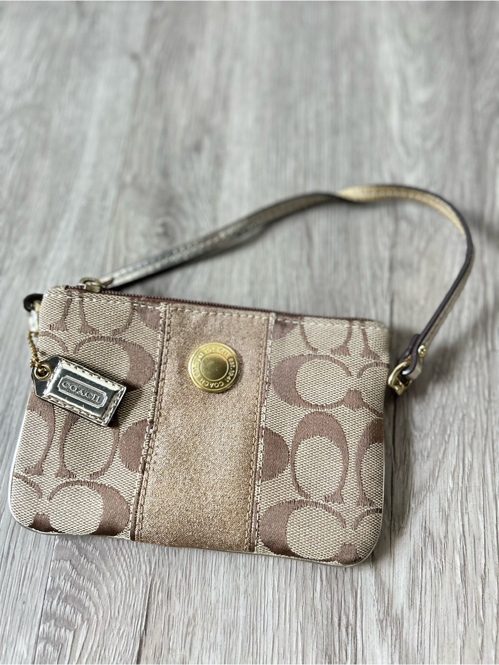 Coach classic wristlet with Brown Logo
